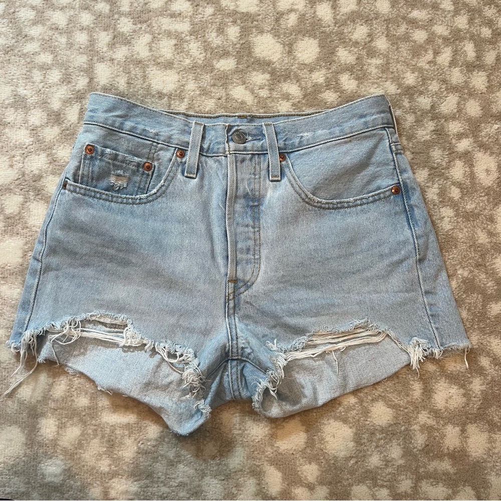 Levi’s 501 Distressed Light Blue Denim Shorts